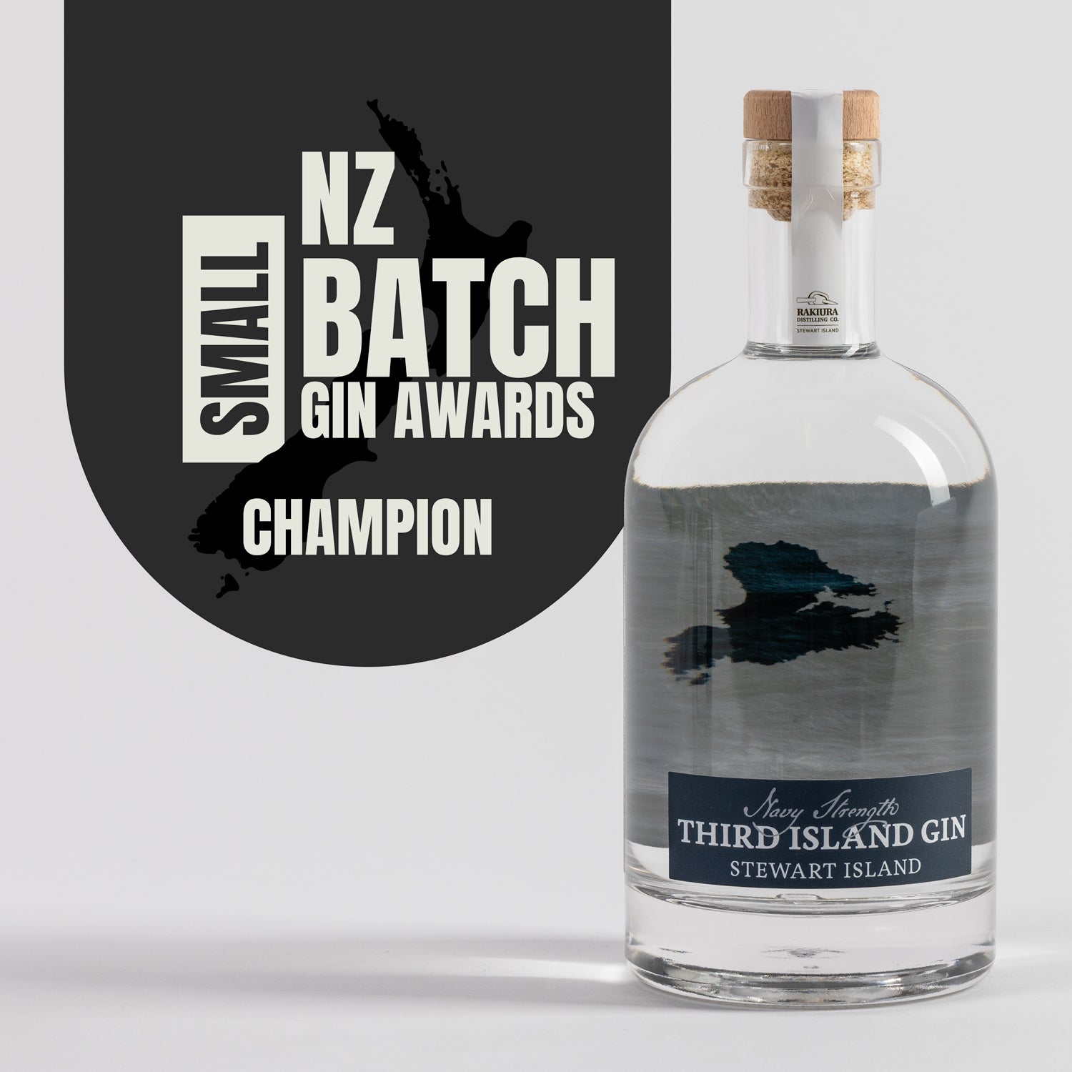 Bottle of Third Island Navy Strength Gin with 'NZ Small Batch Gin Awards Champion' text on a gray background